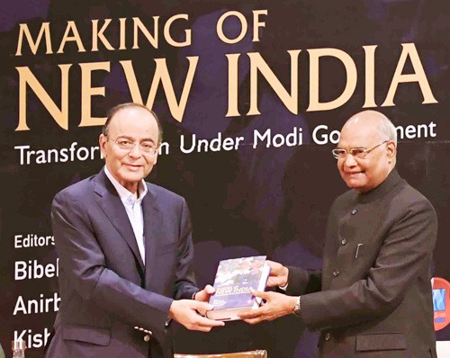 ram nath kovind receiving the first copy of the book