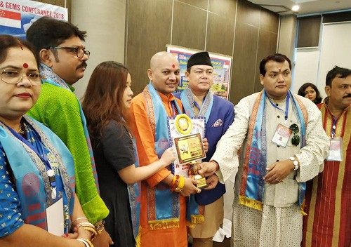 jyotishcharya dr. dhanes mani tripathi honored in singapore